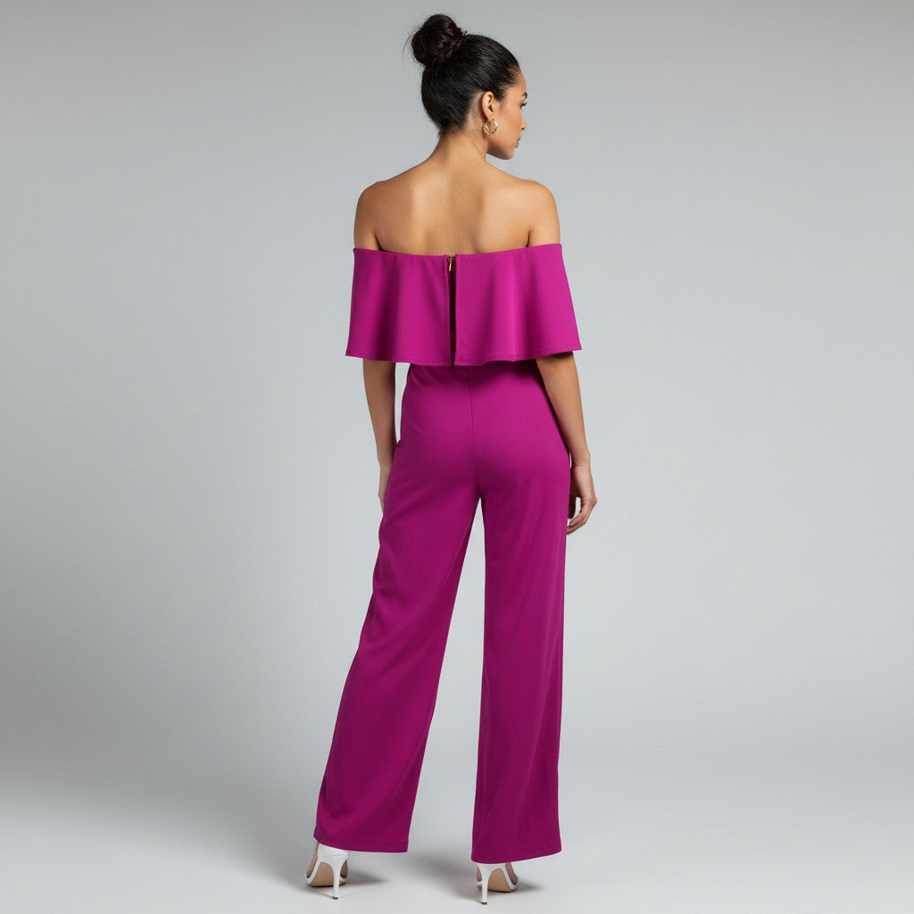 a woman in a pink romper on a white background