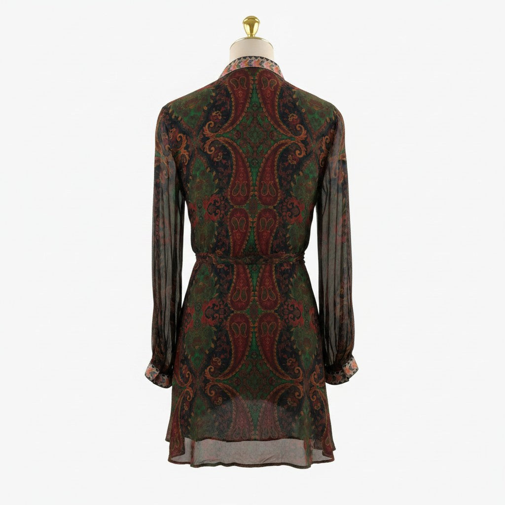 Patterned dress on a mannequin against a white background