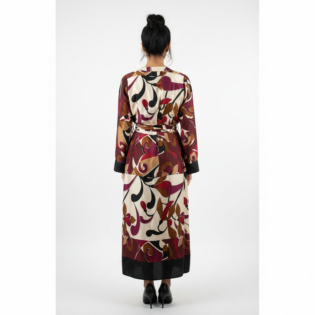 Woman wearing a patterned dress with a white background