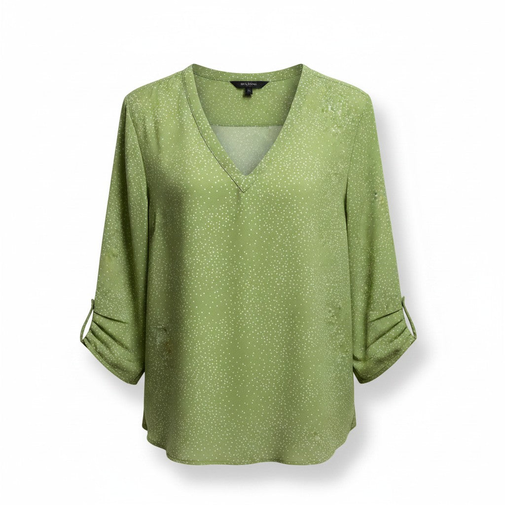 Green blouse with a V-neck and long sleeves on a white background