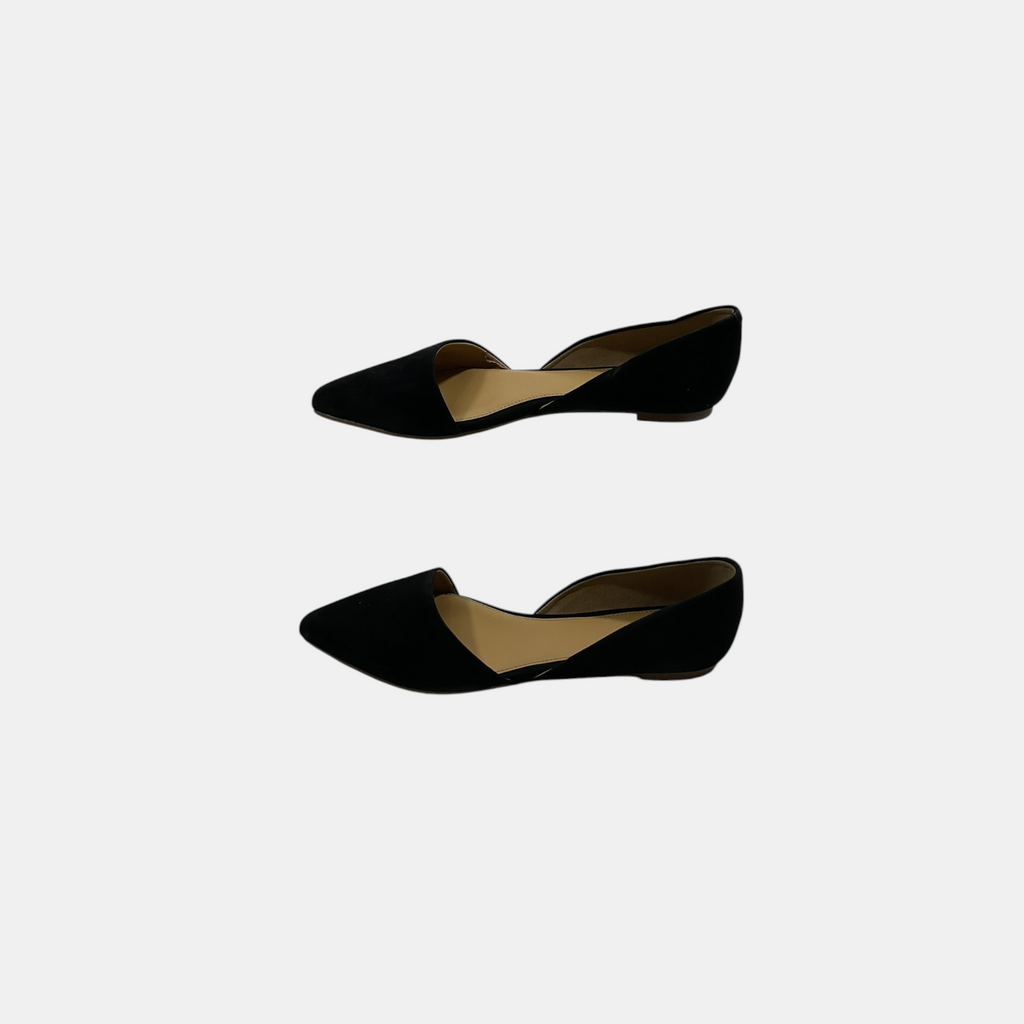 Black wedge shoes on a white background