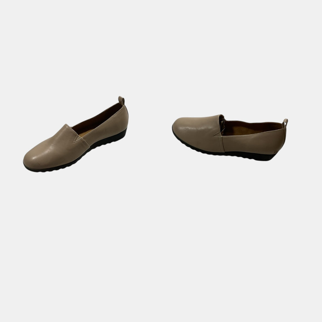 tan leather loafer on a white background