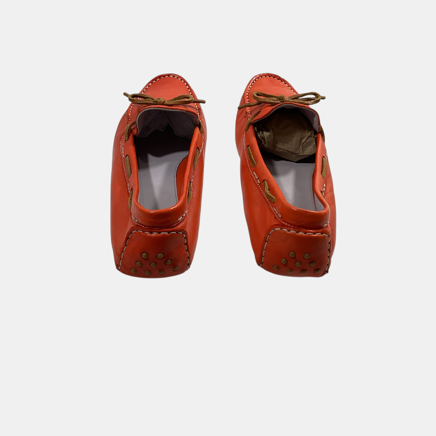 orange Johnston & Murphy loafers on a white background
