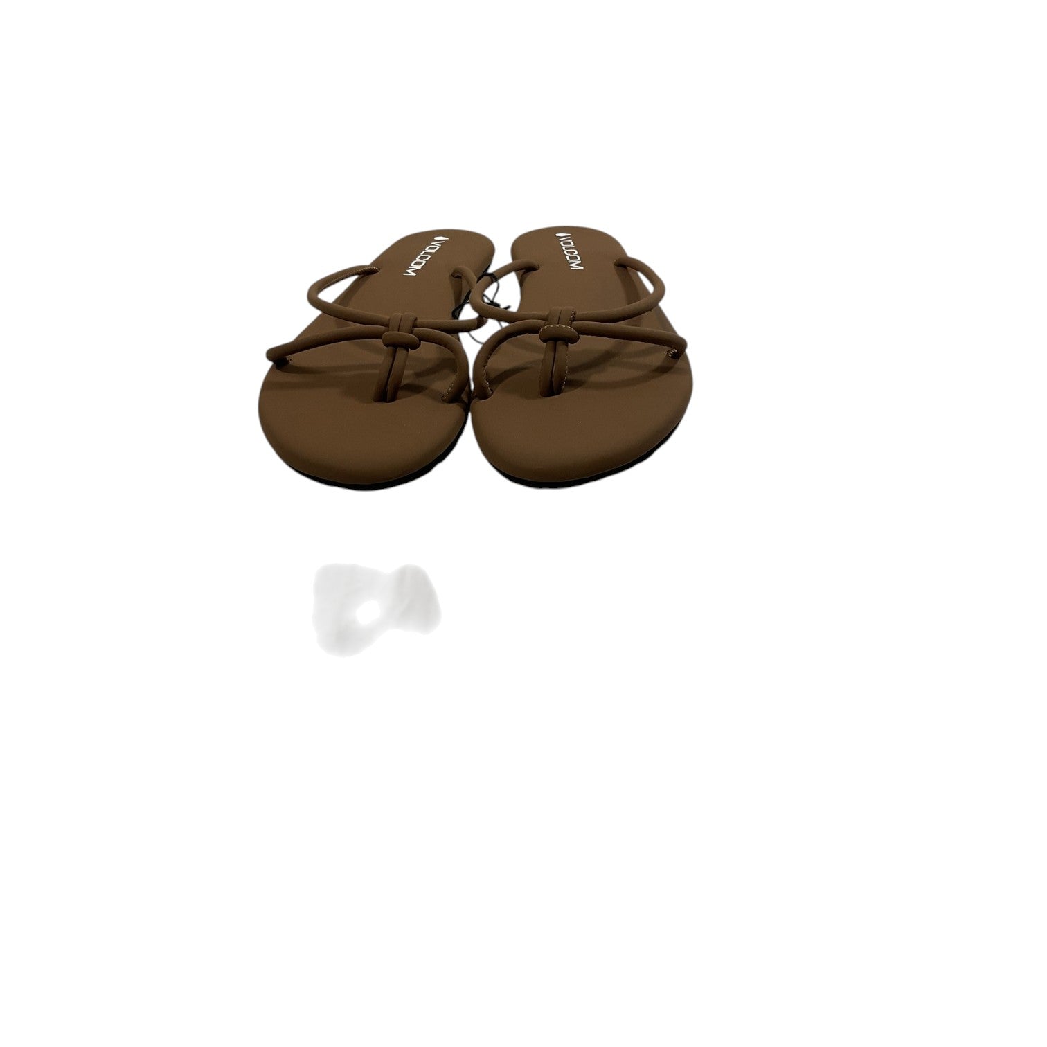Pair of brown sandals on a white background