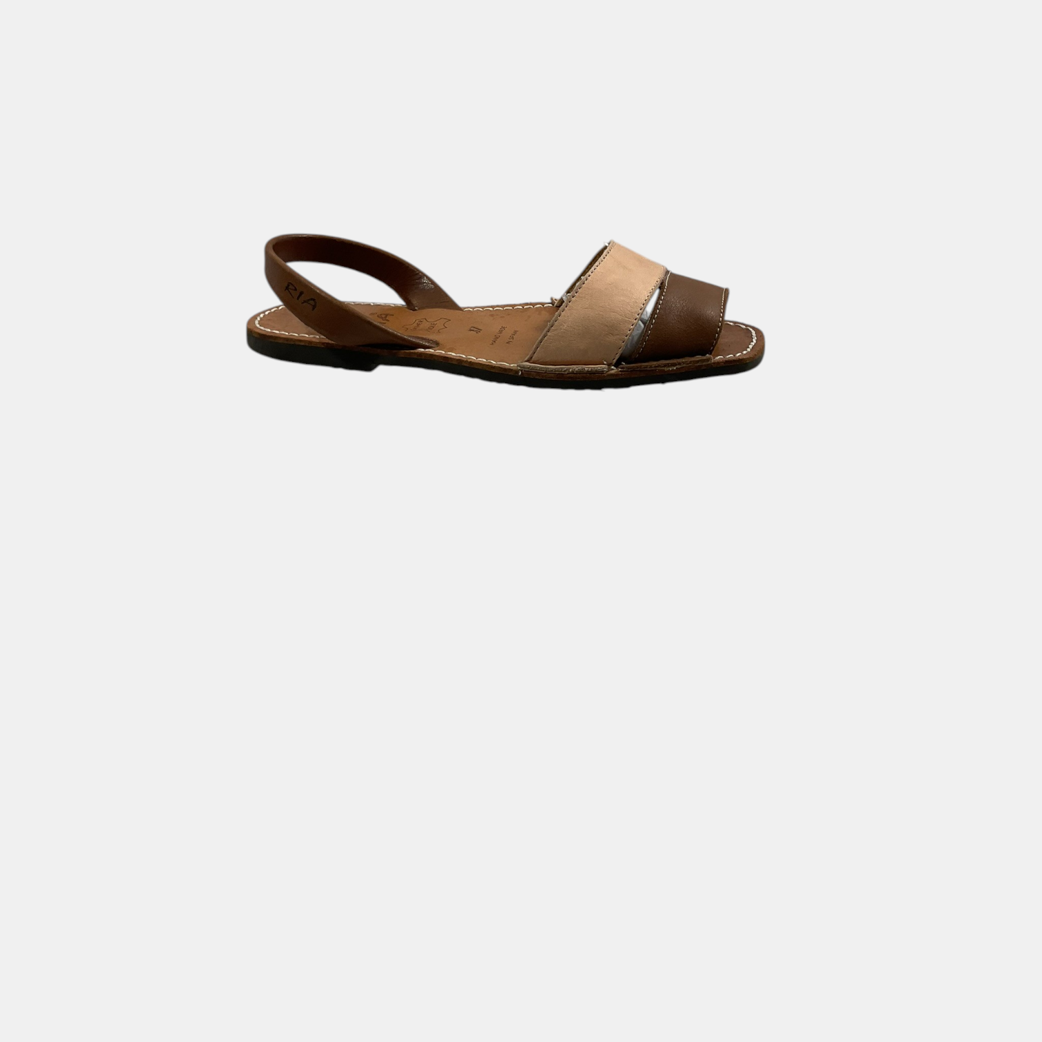 Brown sandal on a white background