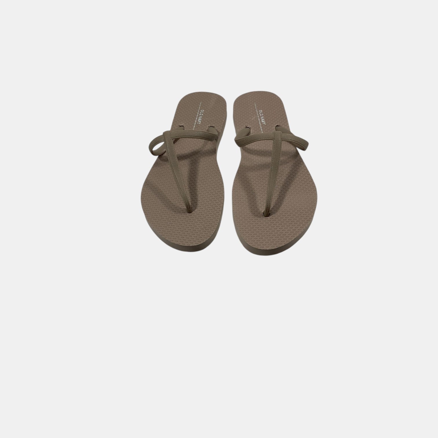 Pair of brown sandals on a white background