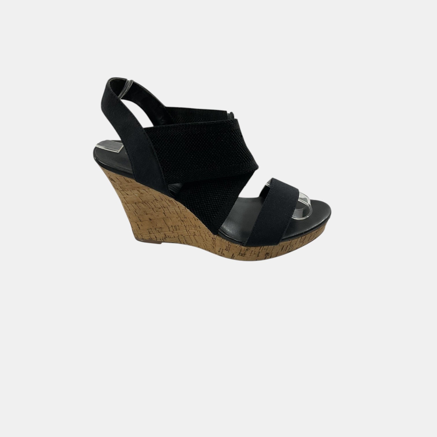 Black wedge sandal on a white background