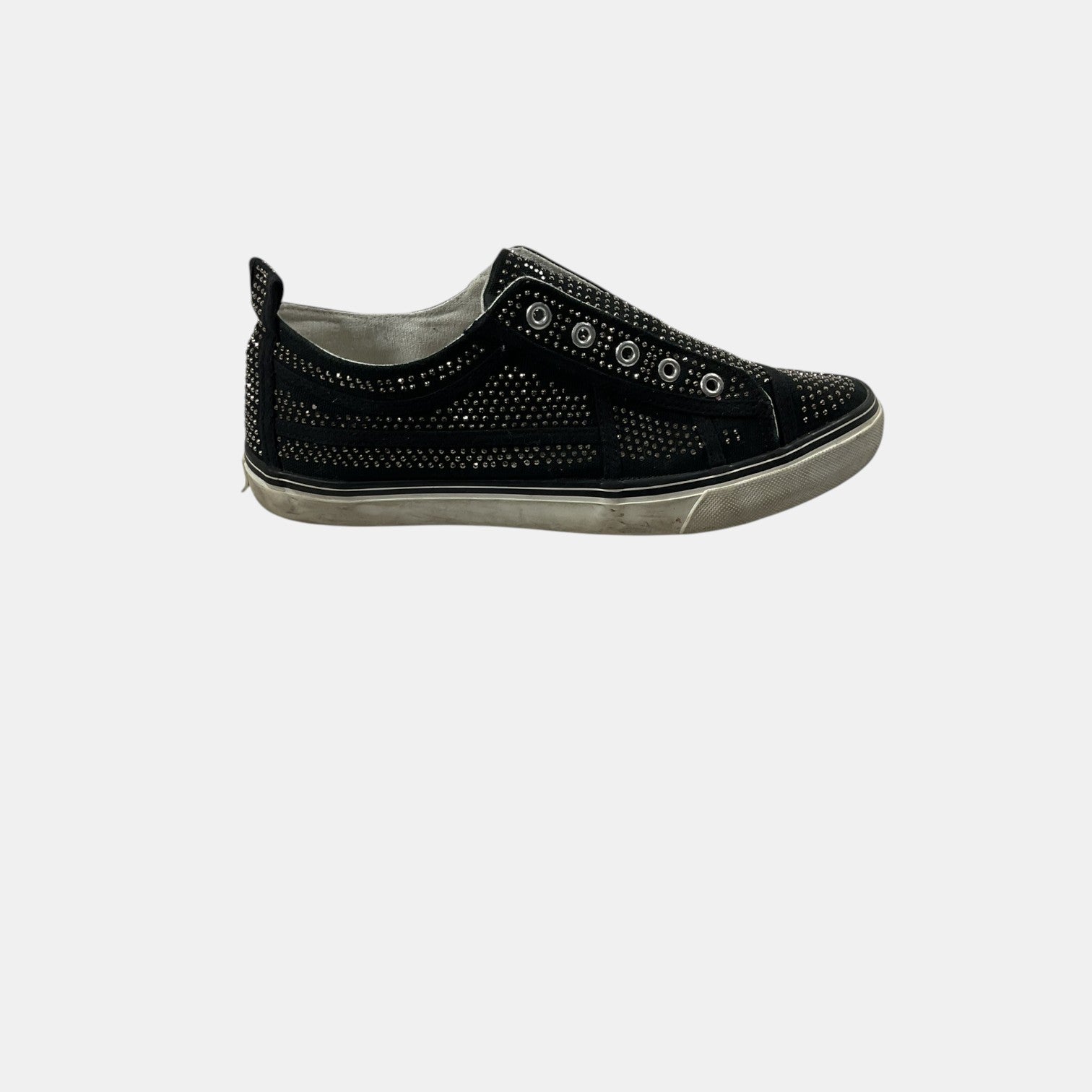 Black sneaker with gray sole on a white background