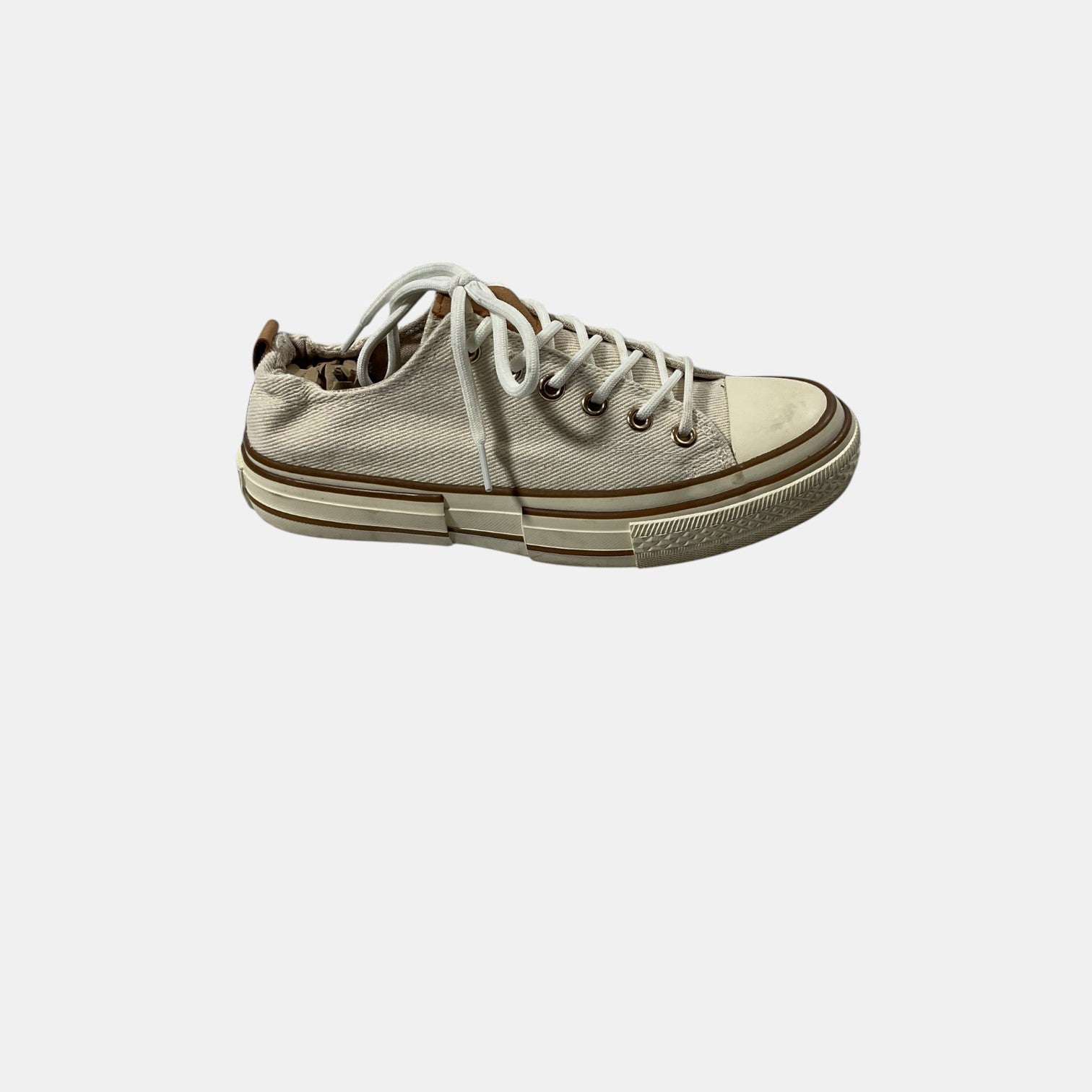 Beige sneaker on a white background
