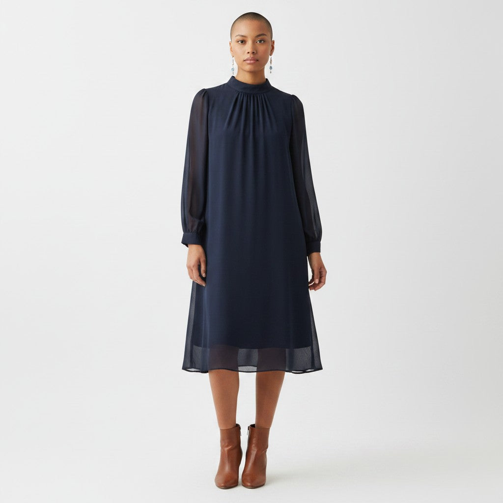 Woman wearing a navy blue dress on a white background