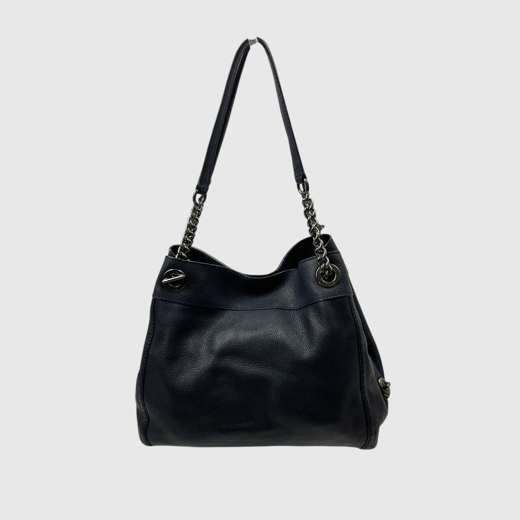 A black leather shoulder bag with a chain strap and silver-tone hardware, shown against a light gray background.