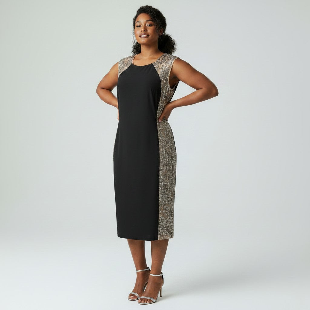 Woman wearing a black dress with patterned sleeves against a white background